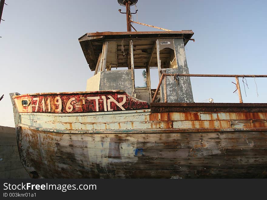 Disused Fishing boat in dry dock Jafa Town, Tel Aviv, Israel. Disused Fishing boat in dry dock Jafa Town, Tel Aviv, Israel.