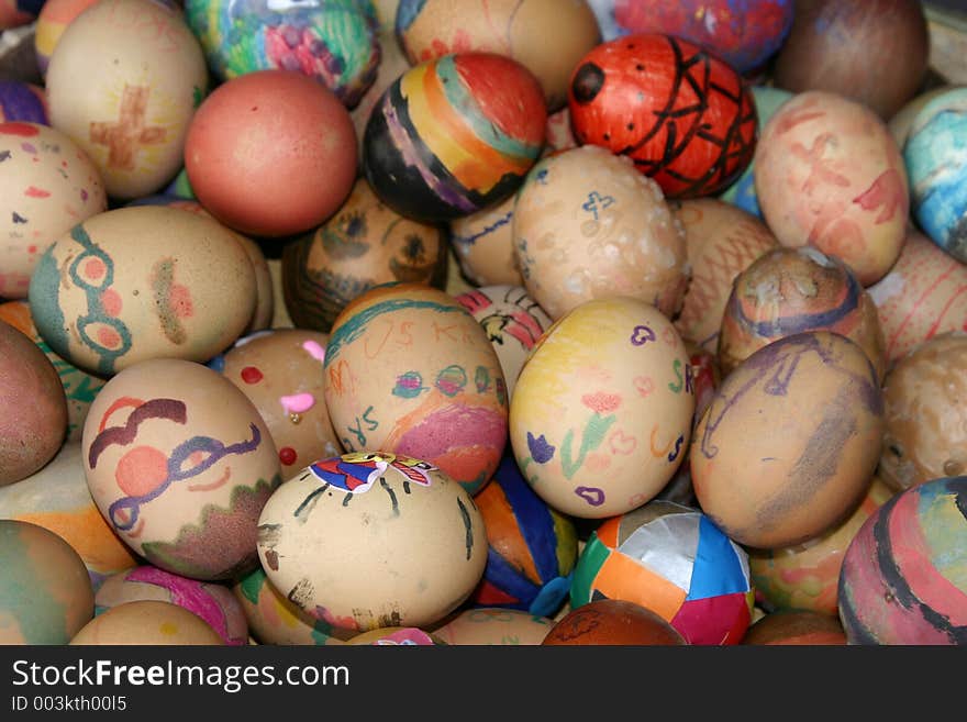 Easter eggs background, decorated by children