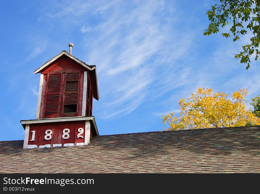 Cupola and roof of historic barn built in 1882 in Bishop Hill, Illinois. Cupola and roof of historic barn built in 1882 in Bishop Hill, Illinois.