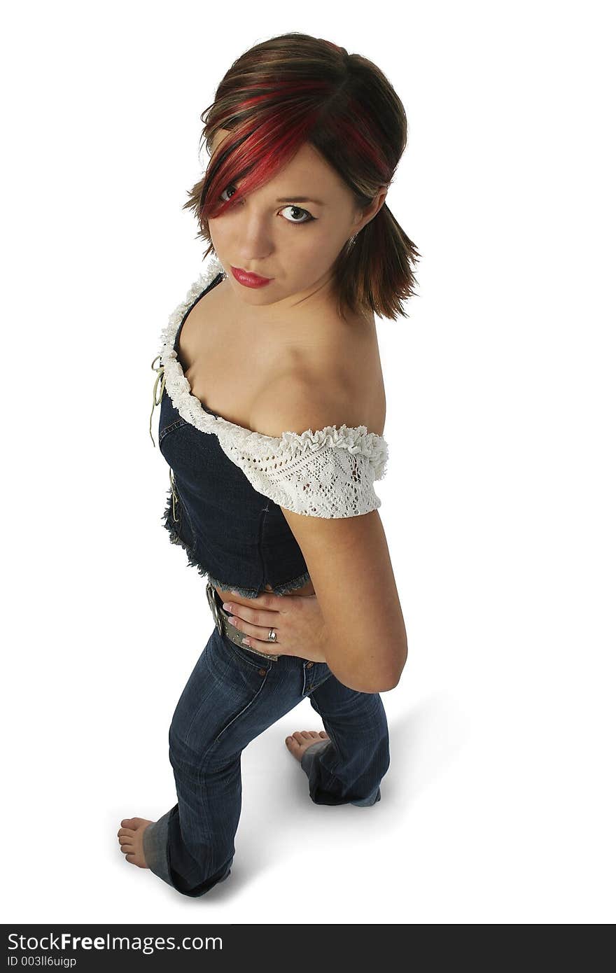 Beautiful young woman standing barefoot over white background.