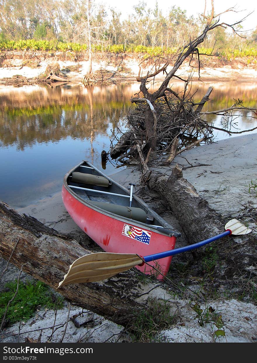 Original image of a canoe on the banks of Peace River in Florida. Original image of a canoe on the banks of Peace River in Florida.