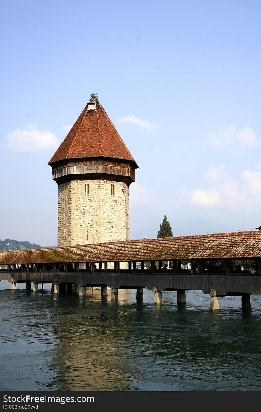 Digital photo of the famous chapel-bridge in Lucerne in switzerland. The bridge was build in the year 1365, it is the oldest and longest (204 m) bridge with a roof in europe.