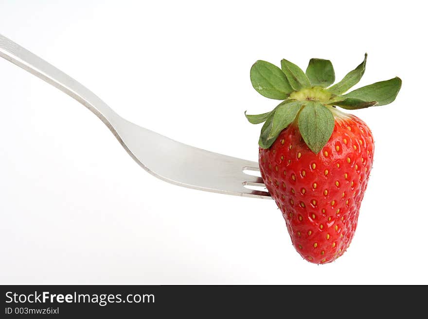 Strawberry and fork