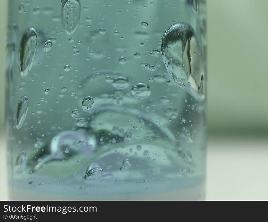 Blue bubbles in a tube. Blue bubbles in a tube