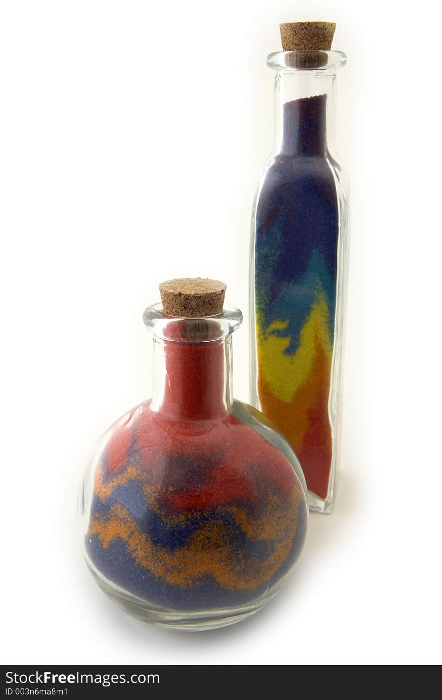 Two Bottles With Colorful Sand