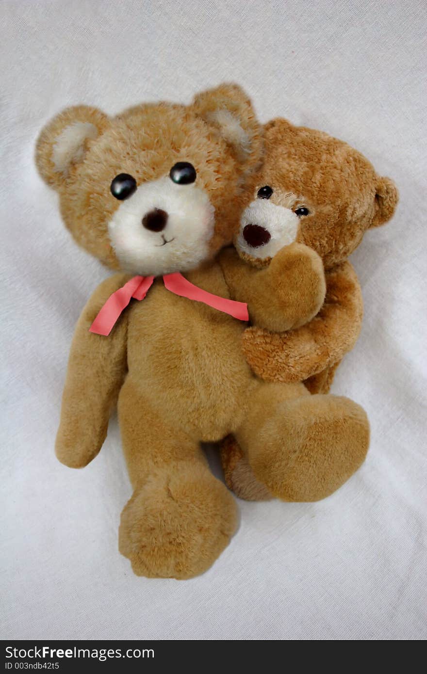 Two loving teddy bears for use in valentine, marriage, anniversary, partnership, courtship, love, romantic, or friendship scenario. Two loving teddy bears for use in valentine, marriage, anniversary, partnership, courtship, love, romantic, or friendship scenario