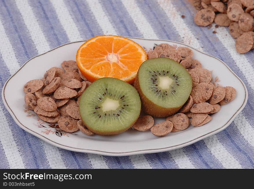 Kiwi, orange and cornflakes. Kiwi, orange and cornflakes