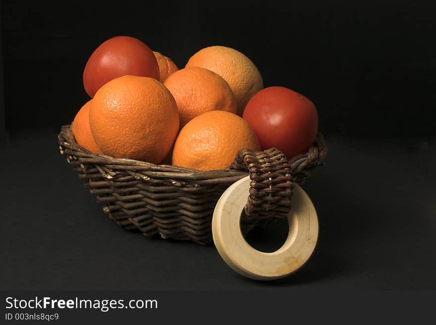 Fruit basket over black