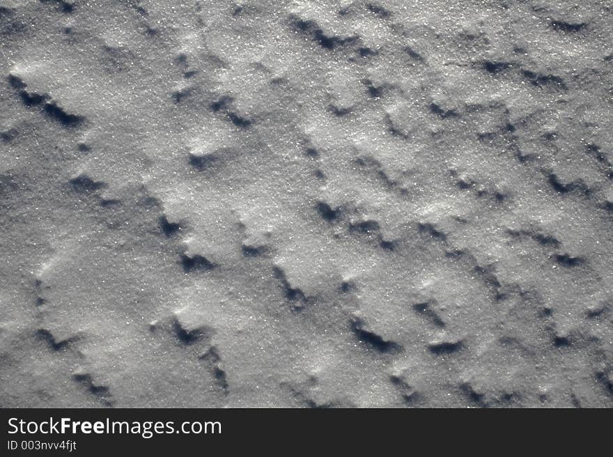 Fragment of a snow-covered surface. Fragment of a snow-covered surface