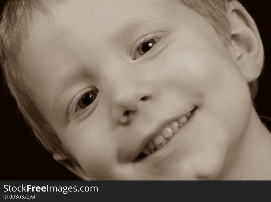 Boy smiling, close-up. Boy smiling, close-up