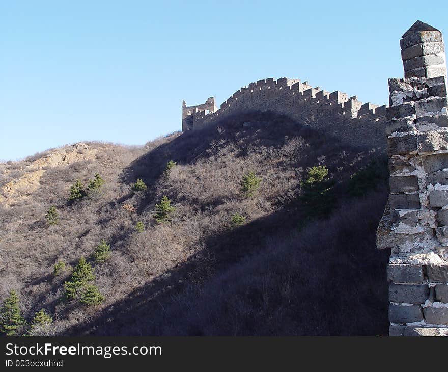 The Great Wall of China, wall on the right, stretches into distance