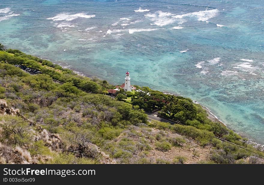 Lighthouse on the shores of South Oahu, just below Diamond Head volcano. Lighthouse on the shores of South Oahu, just below Diamond Head volcano.