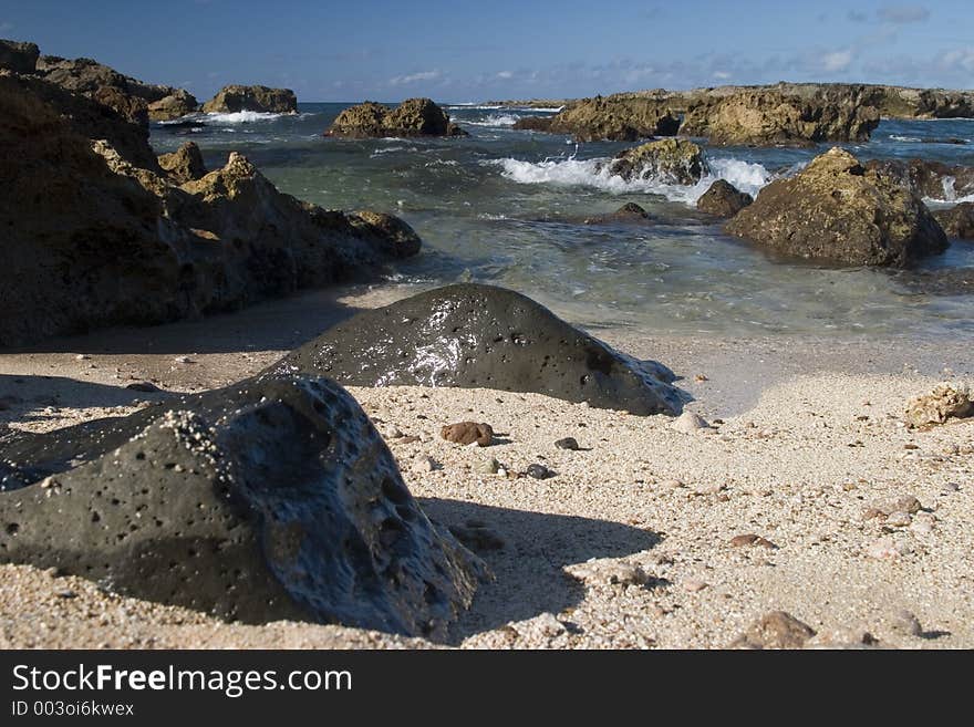 Shark's Cove, one of the many scenic stops along Oahu's famous North Shore. Shark's Cove, one of the many scenic stops along Oahu's famous North Shore.