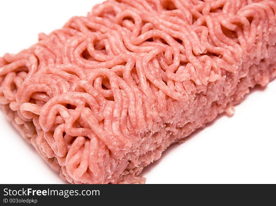 Close-up on a piece of minced meat. Close-up on a piece of minced meat.