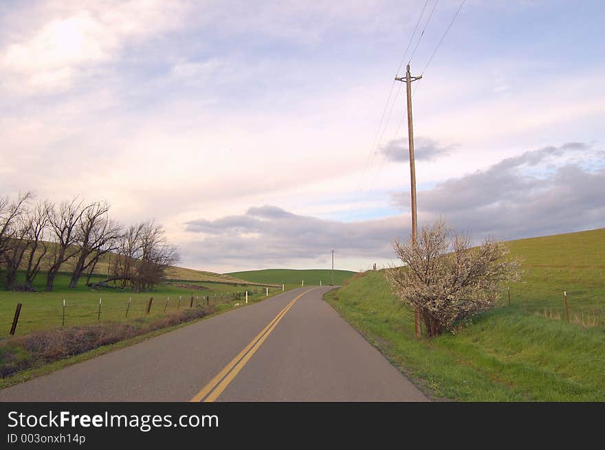 Country road on a cloudy spring afternoon