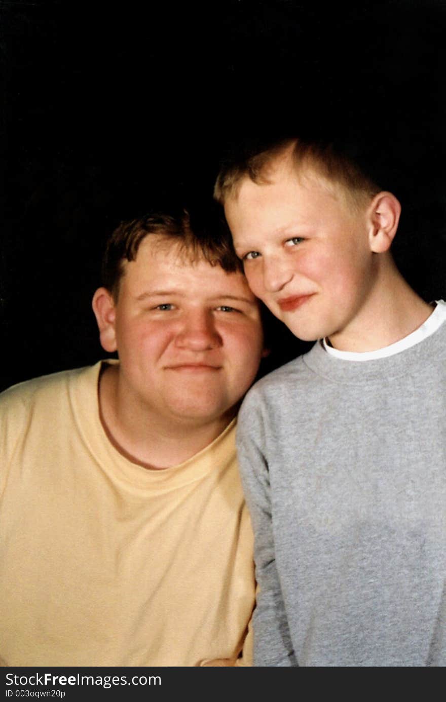 Portrait of two smiling brothers. Portrait of two smiling brothers.