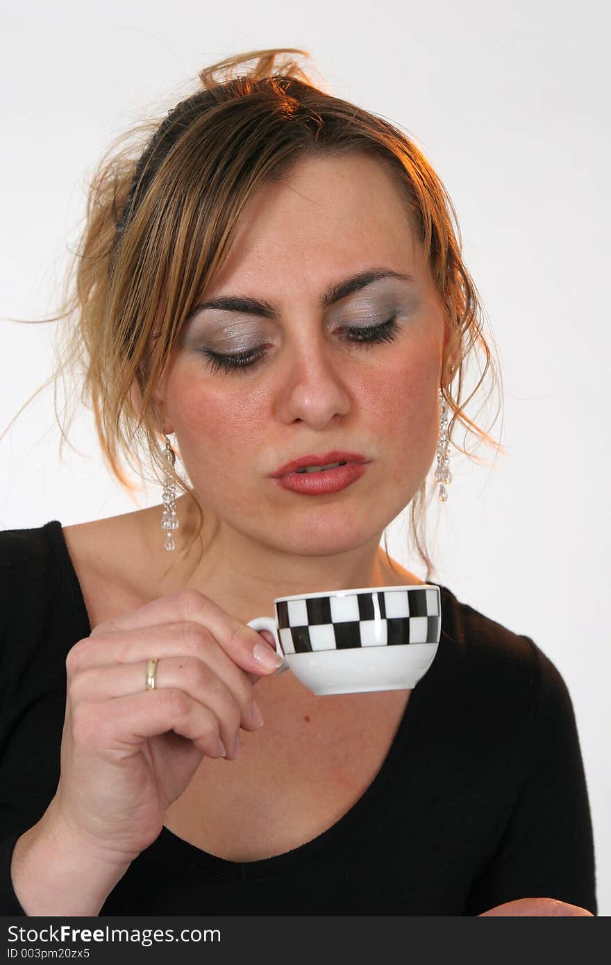 Beautiful girl drinking Espresso. Beautiful girl drinking Espresso