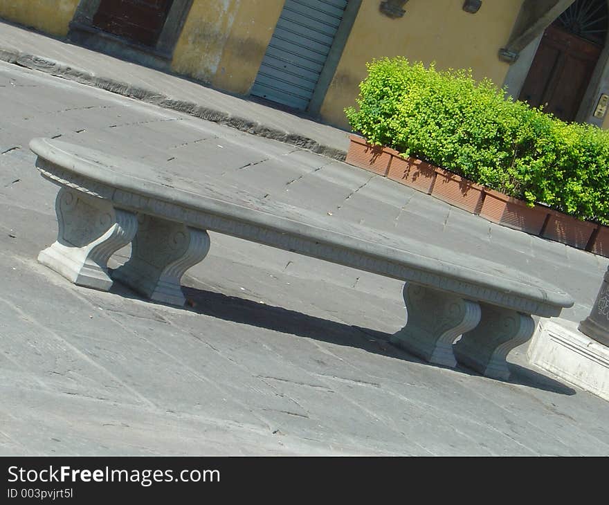 The stone bench in Santa Croce Square, Florence, Italy