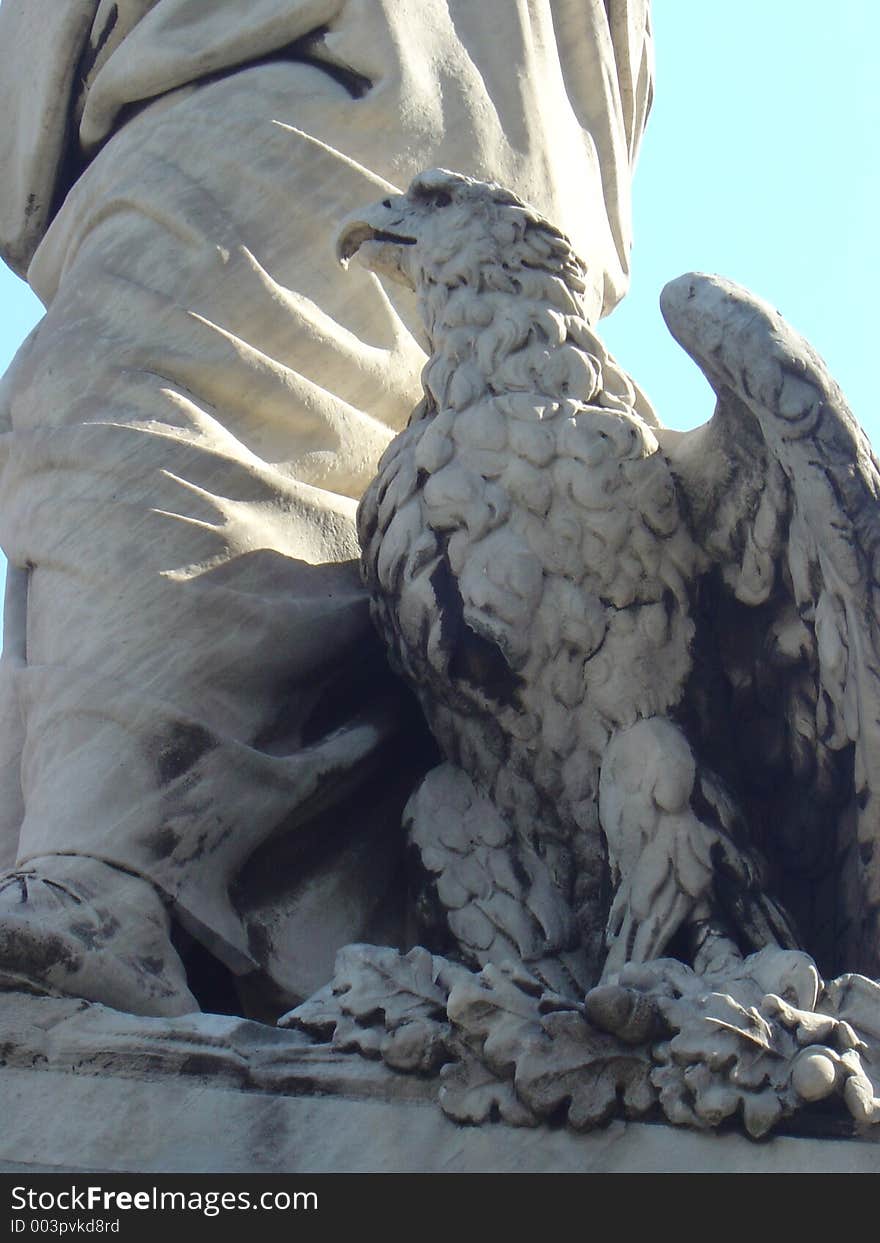 A detail of the eagle on the statue of Dante