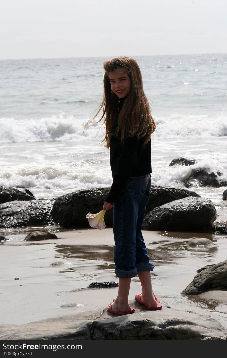 Young girl at the ocean