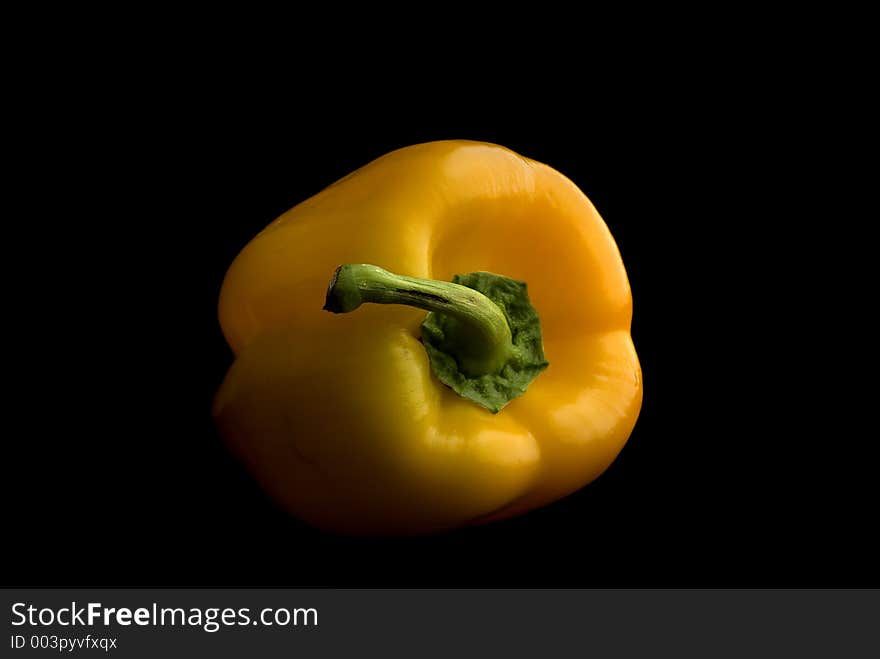 Pepper on black background