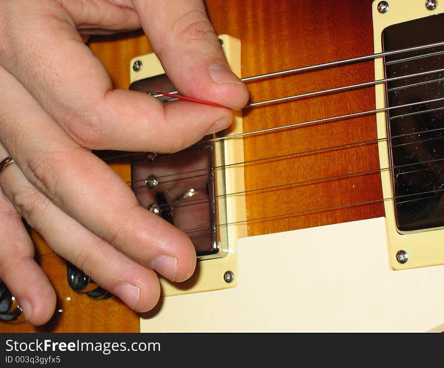 Person playing guitar. Person playing guitar