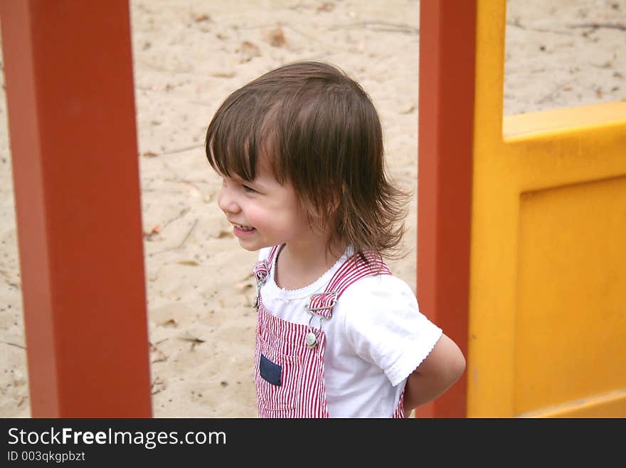 Toddler playing in the park. Toddler playing in the park