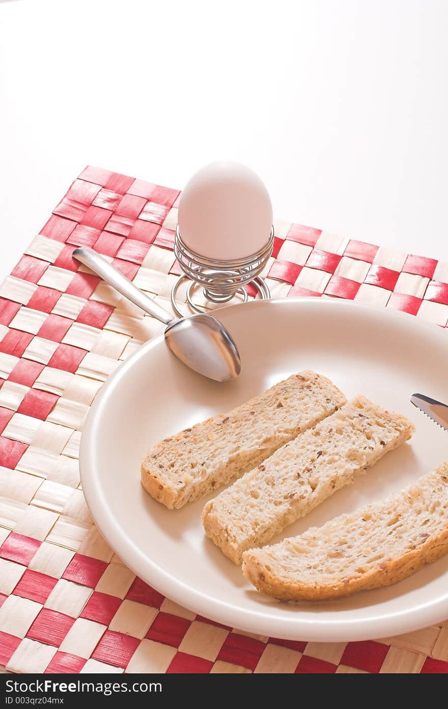 Bread in plate over white