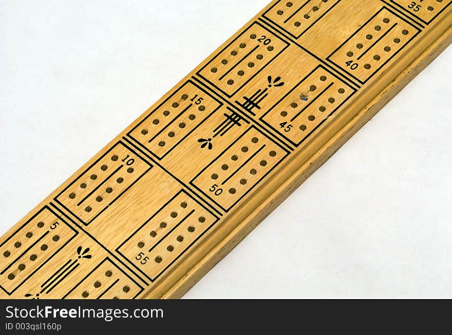 A cribbage board. A cribbage board.