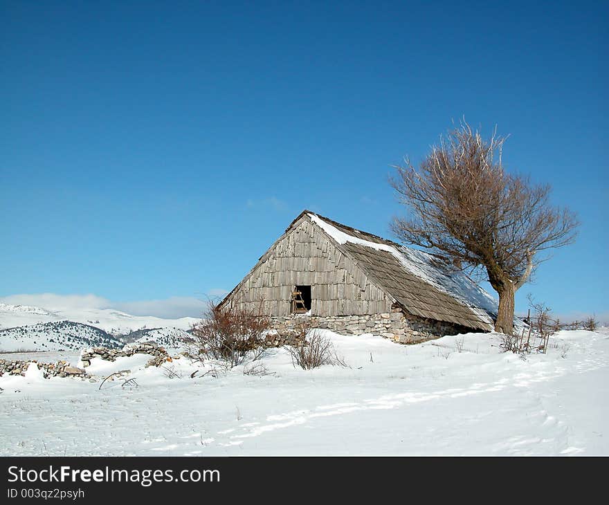 Old wooden house in winter. Old wooden house in winter