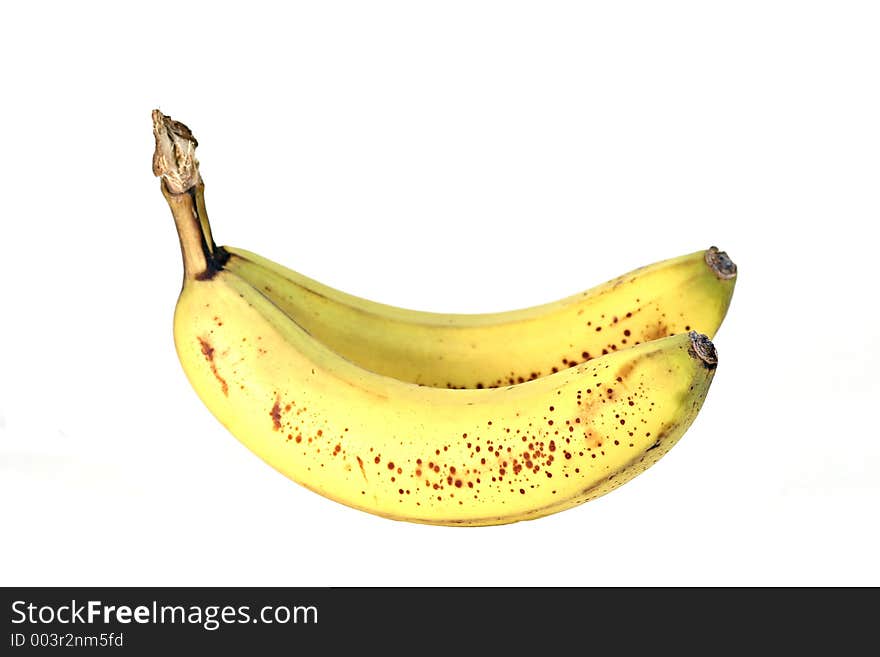 Yellow spotted bananas isolated on white background