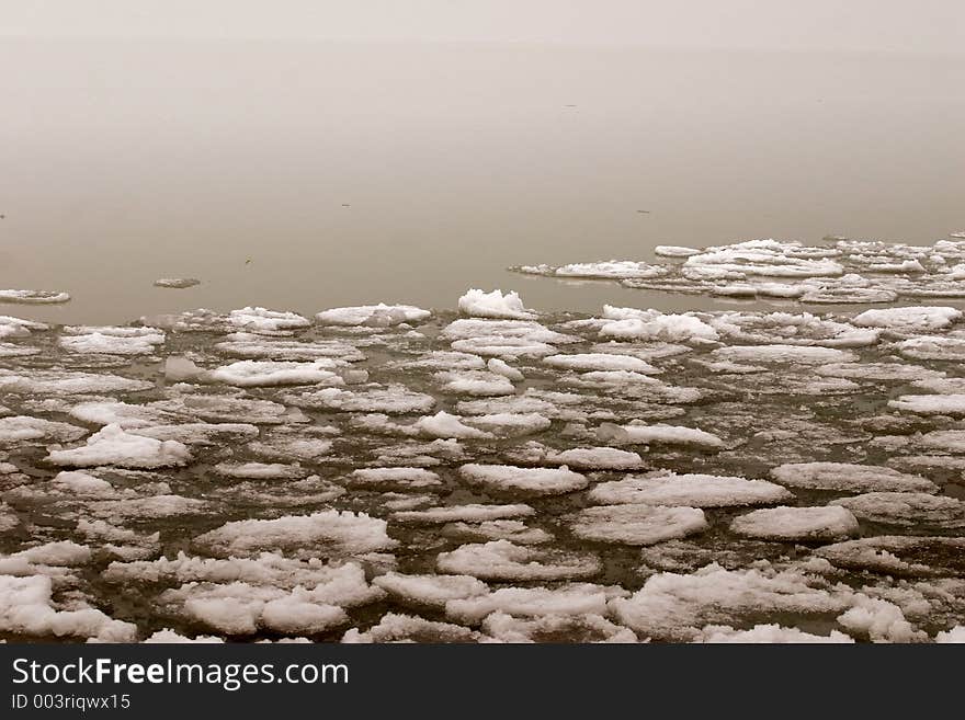 Ice plates from an icefield meet the water.Filter:tobacco-coloured. Ice plates from an icefield meet the water.Filter:tobacco-coloured