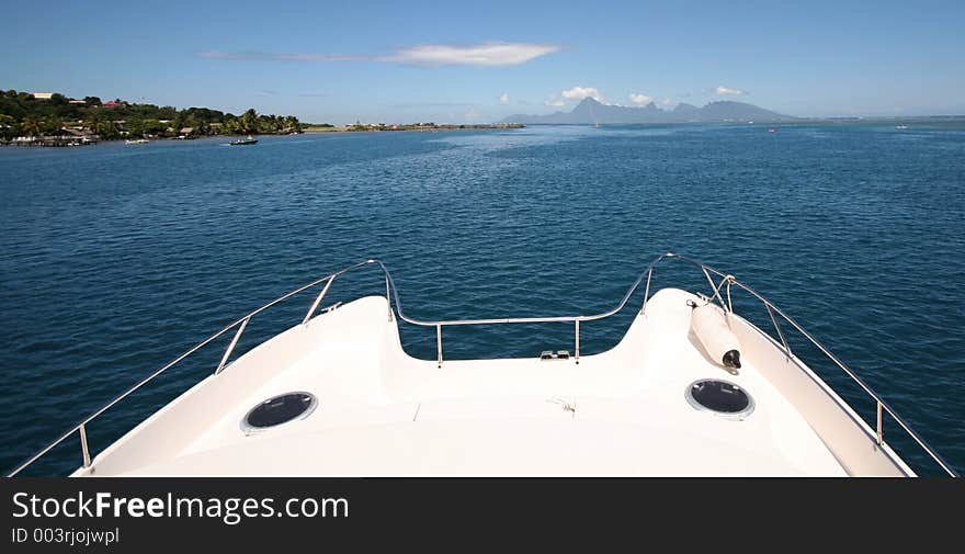 Power catamaran under way on Tahiti lagoon