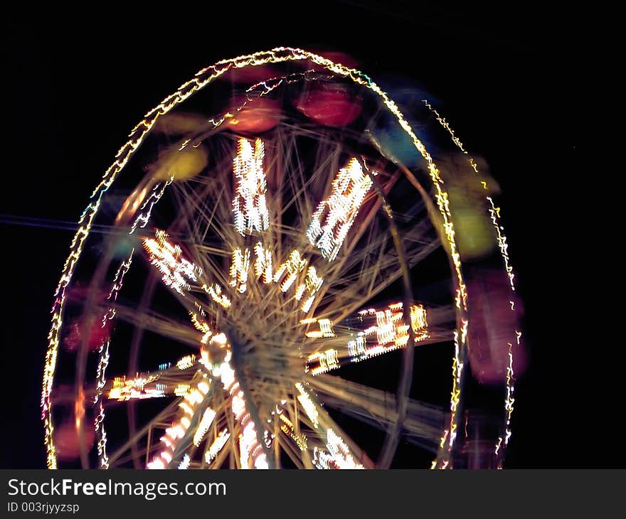 Blurry ferris wheel. Blurry ferris wheel