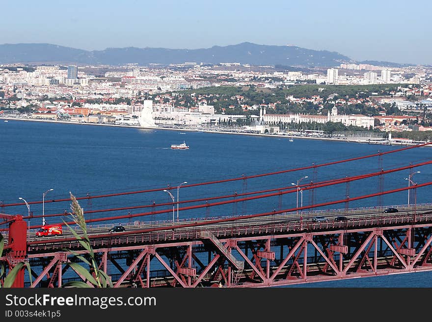 Belem,City of Lisbon,Lisbon Harbour,Portugal,E.U. Lisbon Harbour and the 25th April Bridge span. At the bottom are the Belem historic monuments and landmarks of Portugal, attached to the brave Portuguese navigators of the XV and XVI centuries whom discovered new worlds to the World, discovered nes seas,new continents,new people. Landmarks by the Tagus riverside - Jeronimos Monastery and Discoveries Monument. Belem,City of Lisbon,Lisbon Harbour,Portugal,E.U. Lisbon Harbour and the 25th April Bridge span. At the bottom are the Belem historic monuments and landmarks of Portugal, attached to the brave Portuguese navigators of the XV and XVI centuries whom discovered new worlds to the World, discovered nes seas,new continents,new people. Landmarks by the Tagus riverside - Jeronimos Monastery and Discoveries Monument.