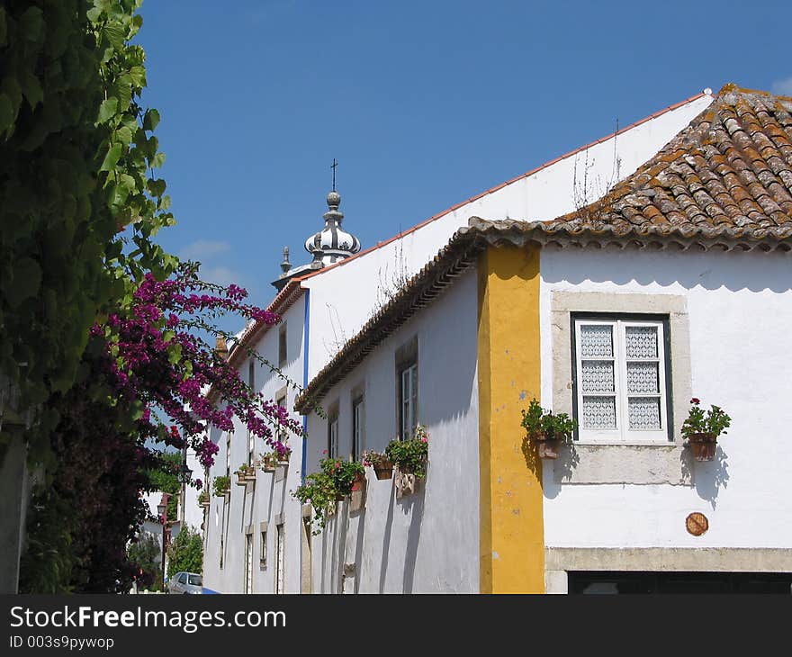 Old village of Óbidos,Portugal,inside the walls of a castle. A delight for the visitors. Old village of Óbidos,Portugal,inside the walls of a castle. A delight for the visitors.