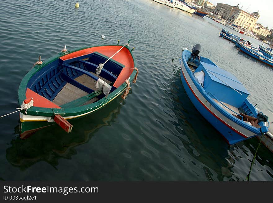 Two coloured fishing boats