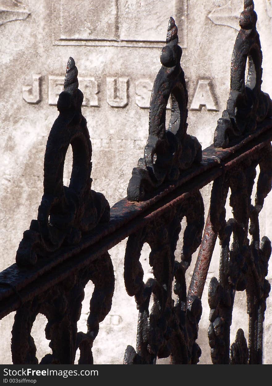 Wrought iron gate at cemetery. Wrought iron gate at cemetery