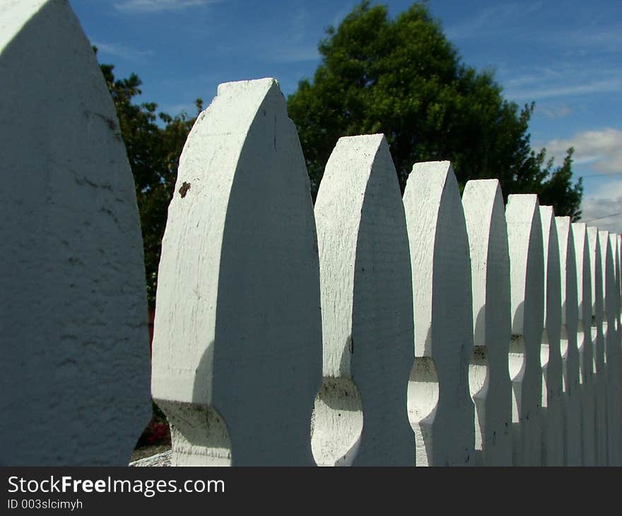 Row of fence pickets. Row of fence pickets