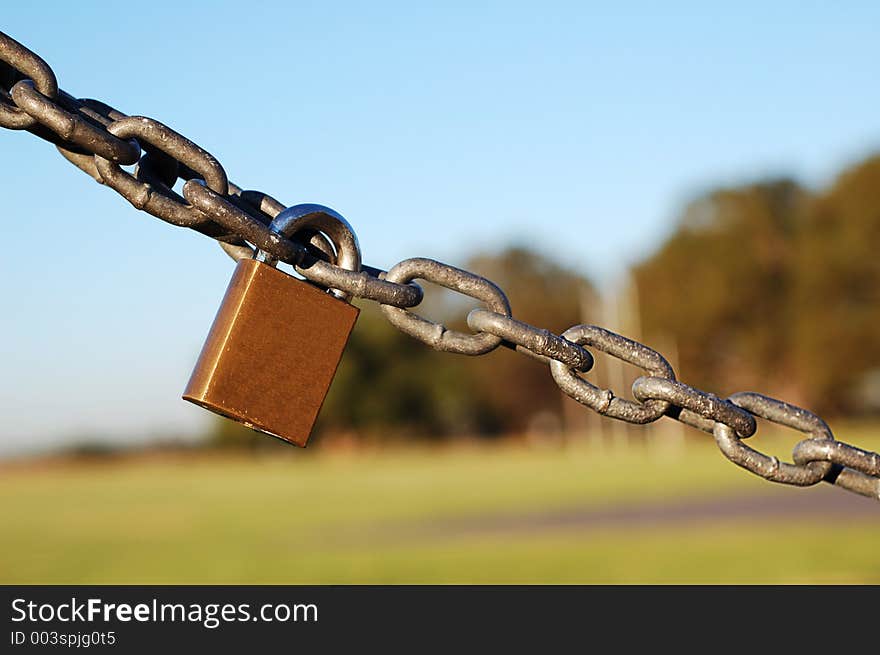 Lock linking the chain in the park. Lock linking the chain in the park