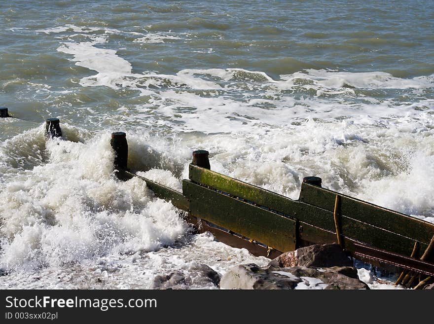 Wooden sea defence on an English beach. Wooden sea defence on an English beach.