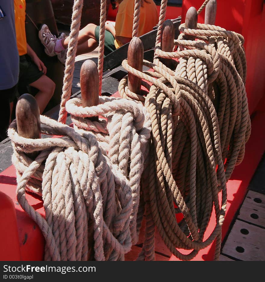 Ropes on an old boat, red colors