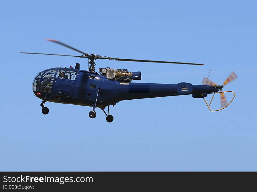 Alouette III helicopter making a fly-by