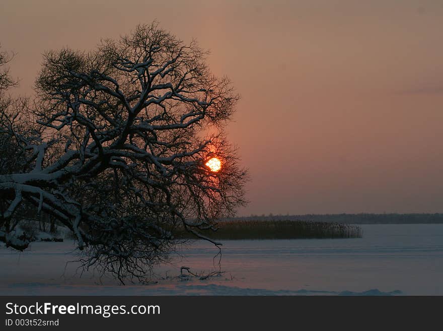 Sunset on frozen lake. Sunset on frozen lake