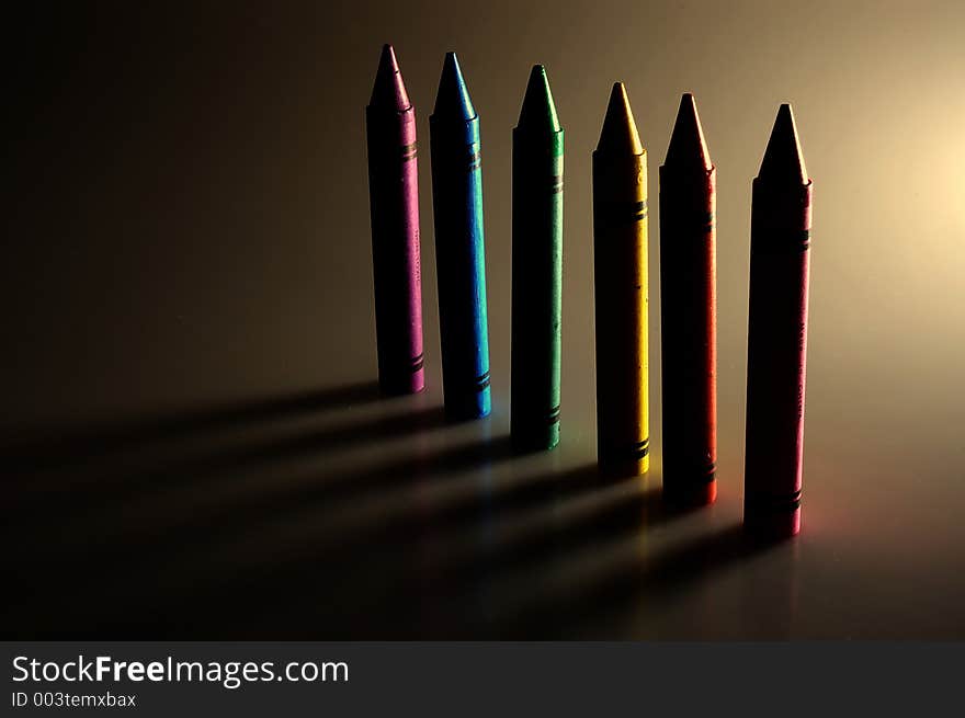 Line of brightly colored crayons. Line of brightly colored crayons