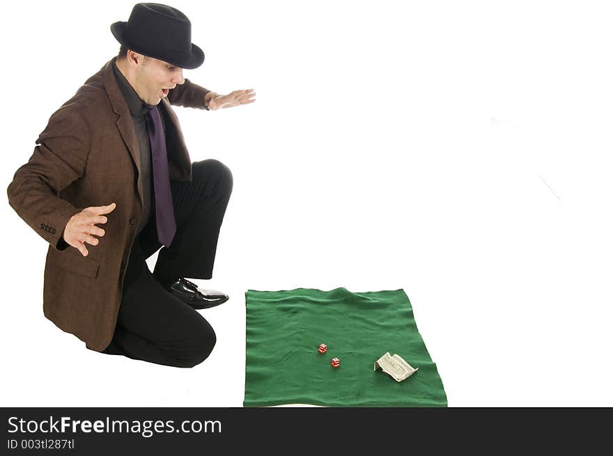 Slick mobster throwing the dice, isolated on white. Slick mobster throwing the dice, isolated on white