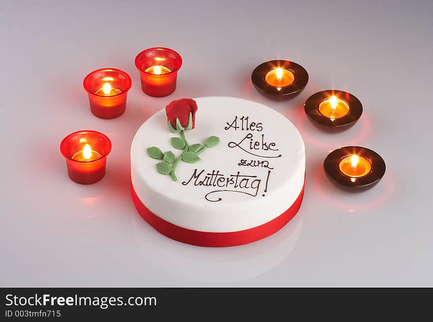 Mothersday tart surrounded by candles. Mothersday tart surrounded by candles