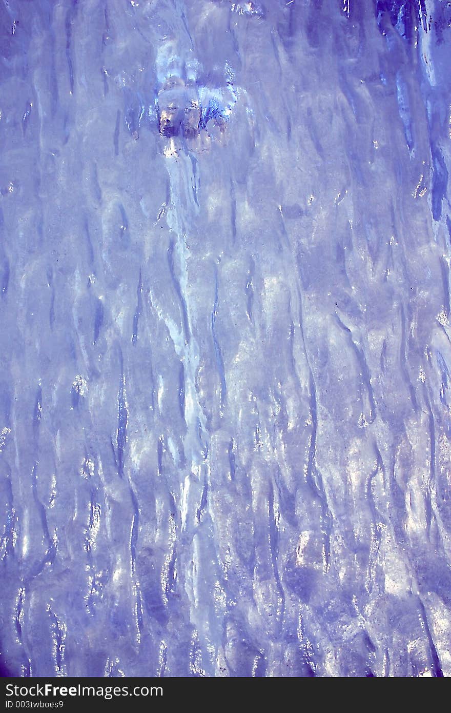 An abstract of rippled plastic toned blue for background. An abstract of rippled plastic toned blue for background