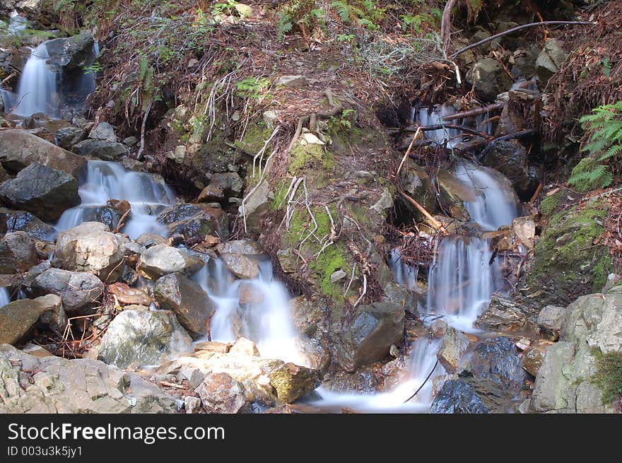 A waterfall in the woods. A waterfall in the woods