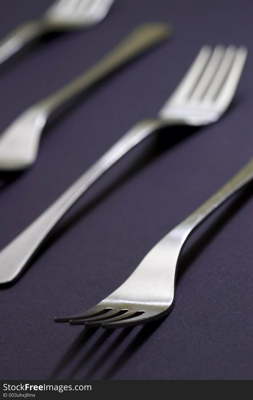 Forks isolated on blue. Forks isolated on blue